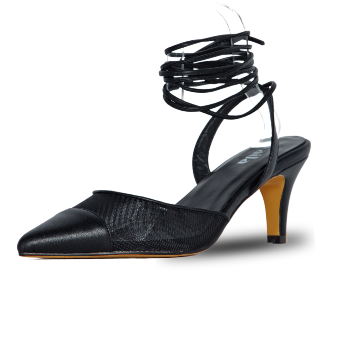 Black strappy high-heeled shoe on a white background