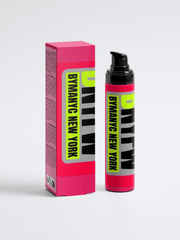 Pink bottle and packaging with 'BYMANYC NEW YORK' branding on a white background