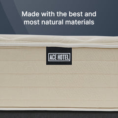 Beige mattress with 'Ace Hotel' label on a dark background