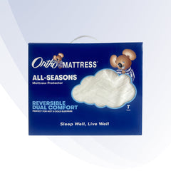 Ortho Mattress All-Seasons mattress protector packaging with cartoon characters on a white background