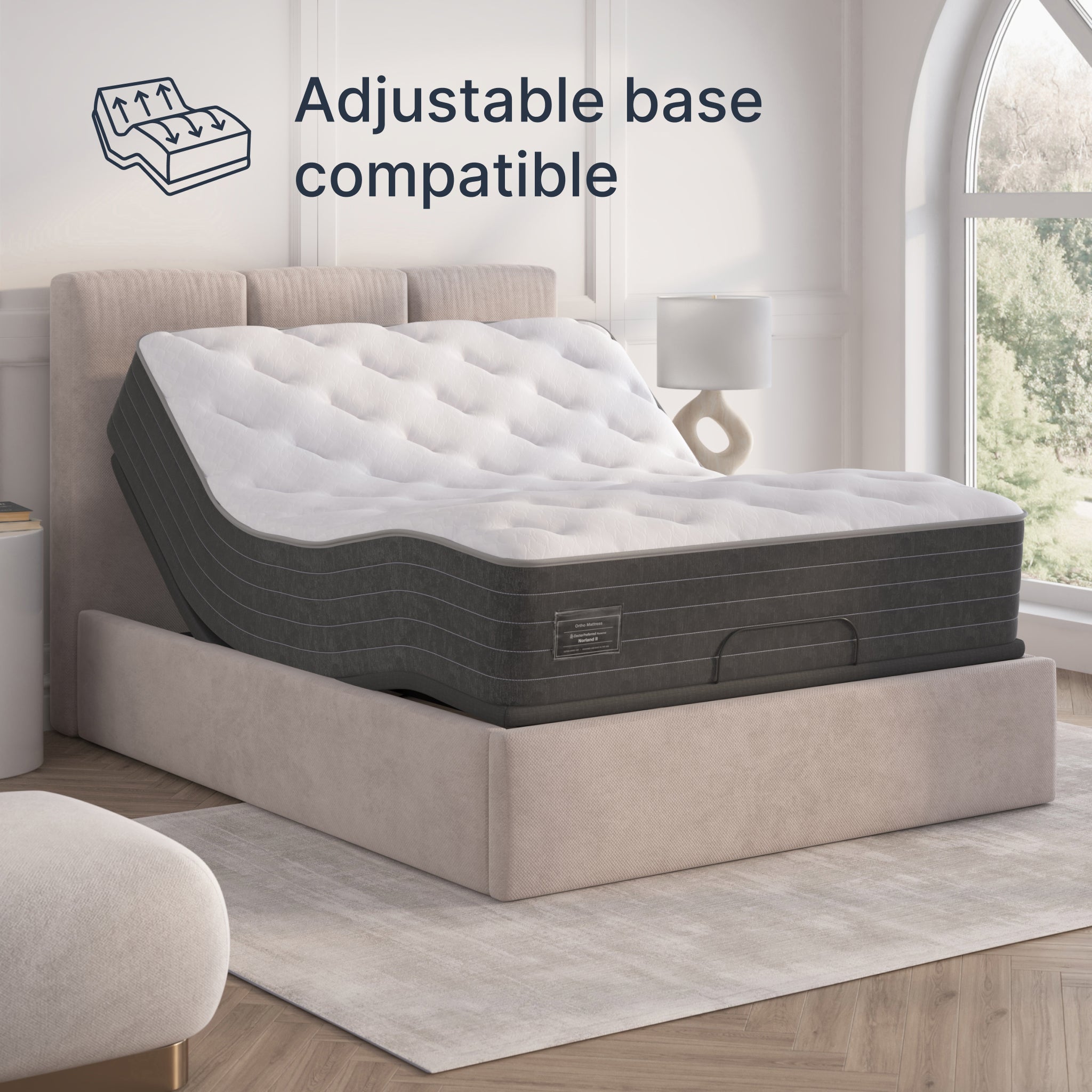Adjustable bed with mattress on a wooden floor in a bedroom setting