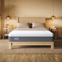 Bed with a mattress in a bedroom setting