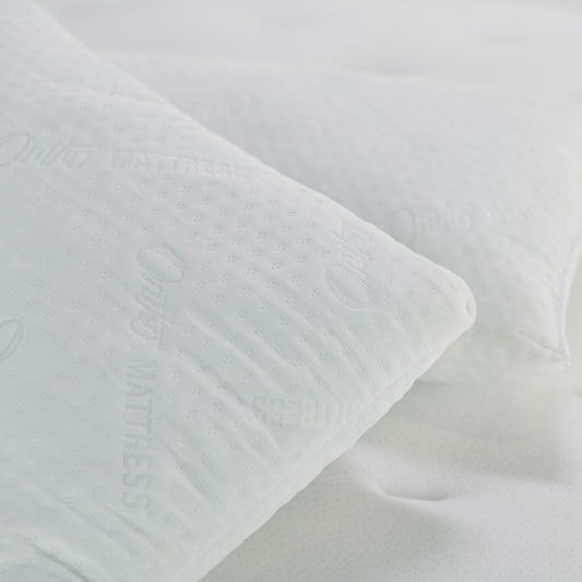 White textured fabric on a light gray background