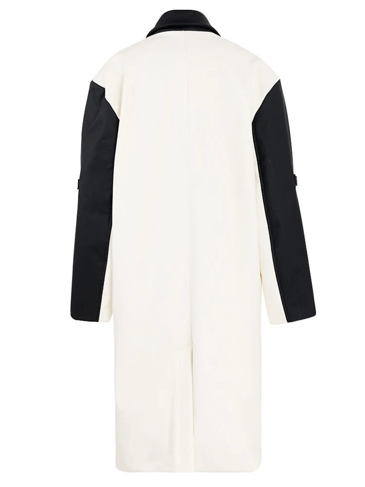 White coat with black sleeves on a white background