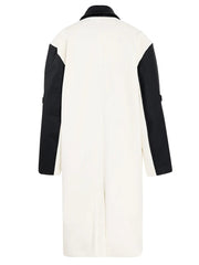 White coat with black sleeves on a white background