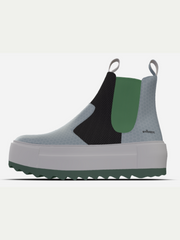 Multicolored sneaker with a platform sole on a white background
