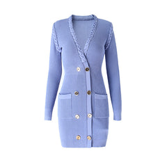 Light blue cardigan with button details on a white background