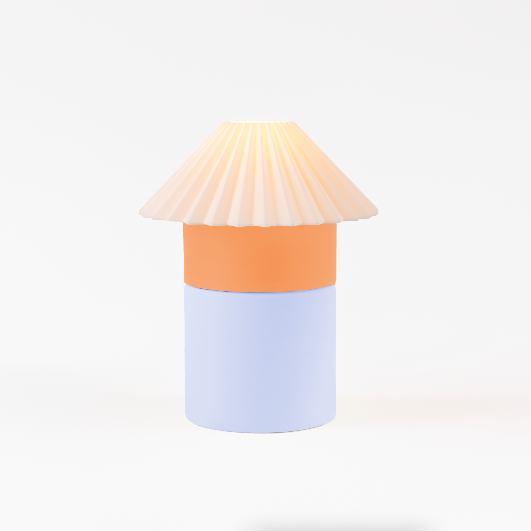 Decorative lamp with a pleated design on a white background