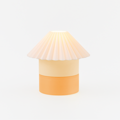 Lamp with a shell-like design on a white background