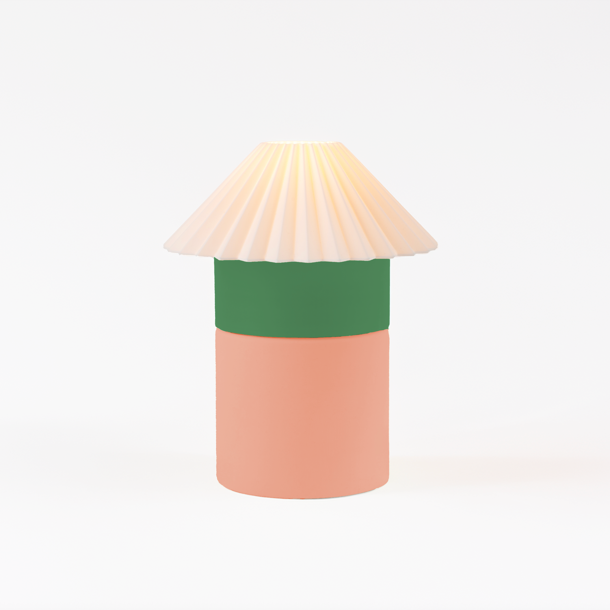 Decorative lamp with a green band and beige shade on a white background
