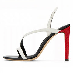 High-heeled sandal with white strap and black heel on a white background