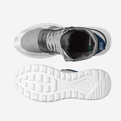 White athletic shoe with a textured sole on a white background