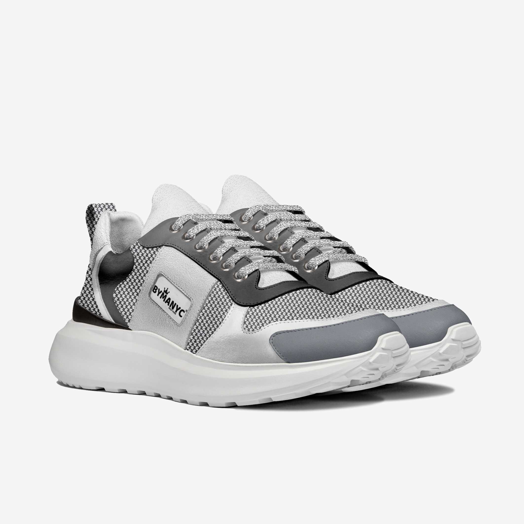 Gray and white sneaker with brand logo on a white background