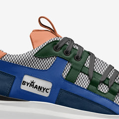 Close-up of a blue and green sneaker with BYMANYC branding on a white background