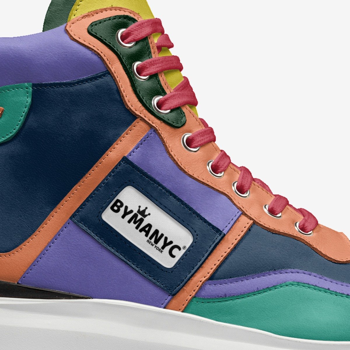 Colorful sneaker with a ByManyC label on a white background