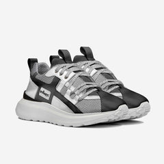 Black and gray sneaker with white sole on a light gray background