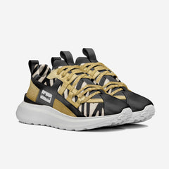 Black and gold sneaker with zebra pattern on a white background