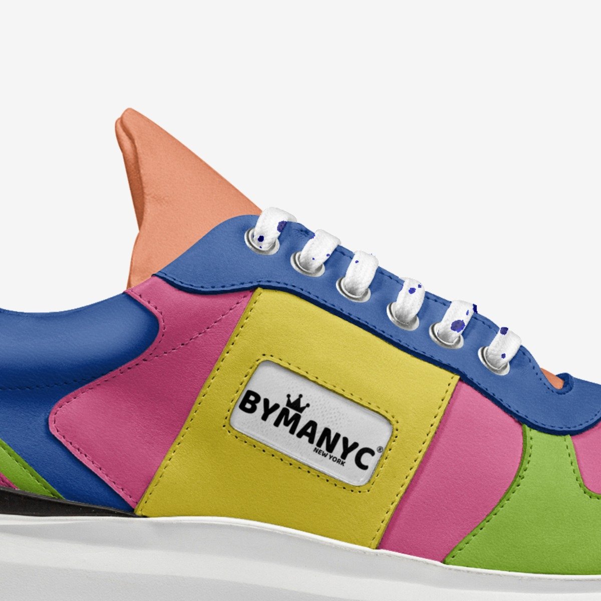 Colorful sneaker with 'BYMANYC' logo on a white background