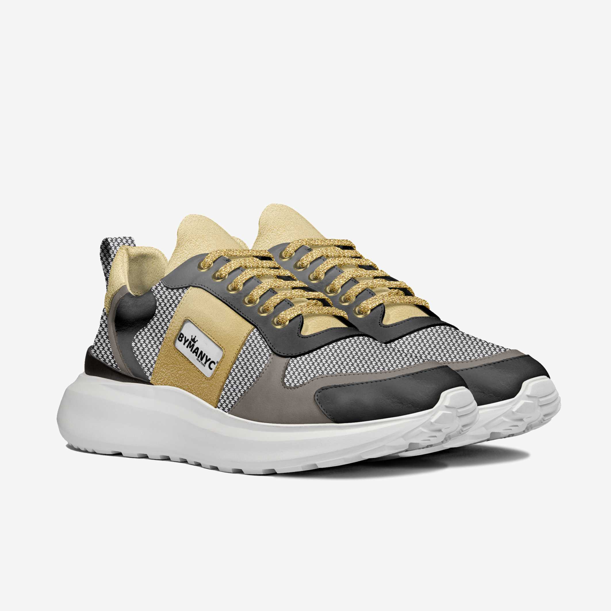 Gray and beige sneaker with a visible brand logo on a white background