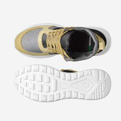 Gold and black sneaker with white sole on a light gray background