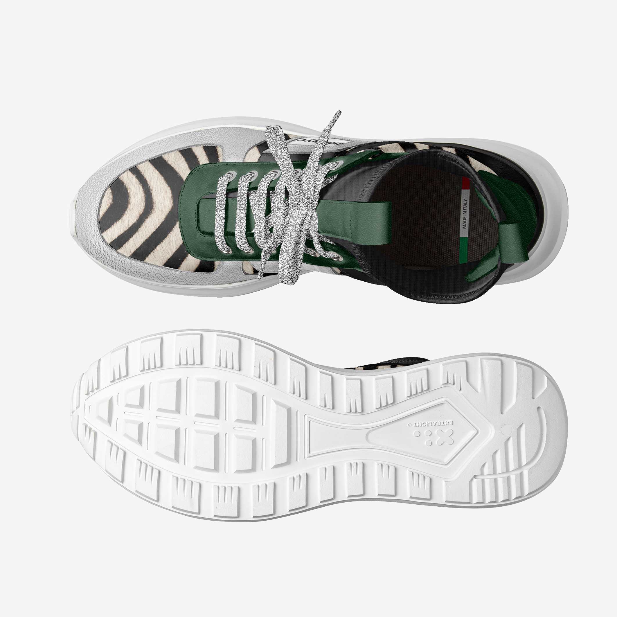 Sneaker with zebra pattern sole and white sole on a light gray background