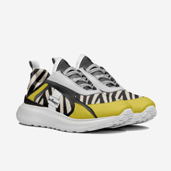 Sneaker with zebra pattern and yellow accents on a white background