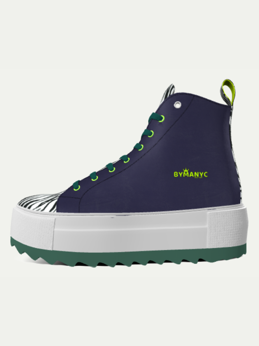 Navy high-top sneaker with green accents and white sole on a light gray background