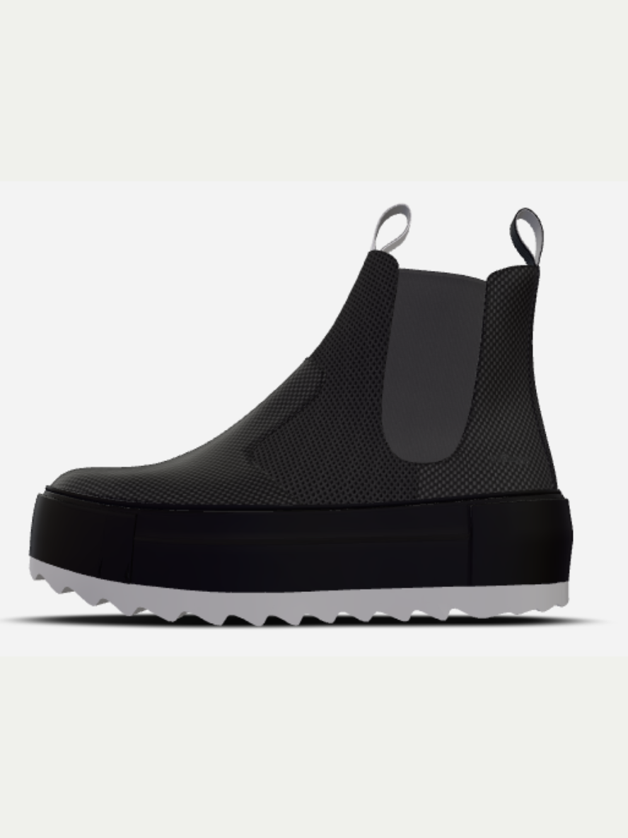 Black rain boot on a light gray background