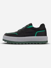 Black and green sneaker with white sole on a light gray background