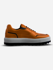 Orange sneaker with black accents on a white background