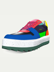 Multicolored sneaker with a platform sole on a light gray background