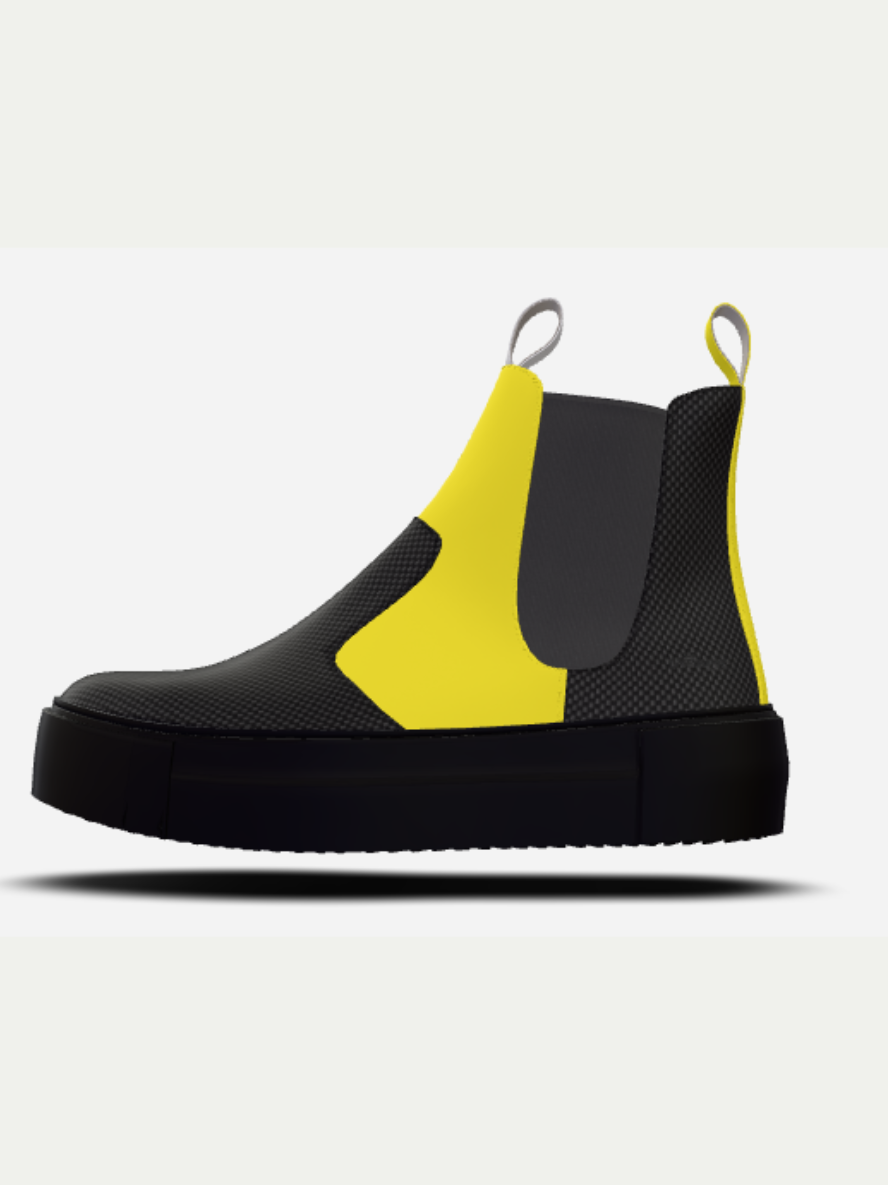 Black and yellow rain boot on a white background