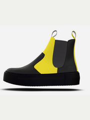 Black and yellow rain boot on a white background