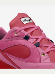 Pink and red sneaker with 'Bymany' branding on a white background