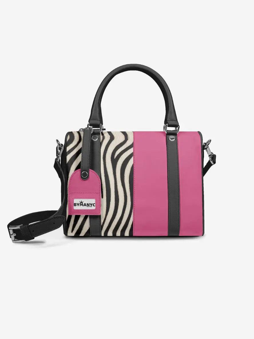 Handbag with zebra pattern and pink accents on a white background