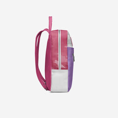 Colorful backpack with pink, purple, and white sections on a light gray background