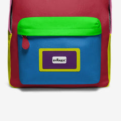 Colorful backpack with a By Many logo on a white background