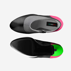 Black shoe insole with pink and green accents on a white background
