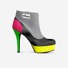 Colorful high-heeled shoe with 'BYMANYC' branding on a white background