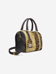 Two-tone handbag with leopard print and black leather on a white background