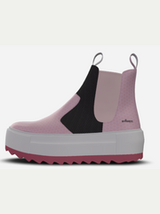 Pink Chelsea boot with white sole on a light gray background