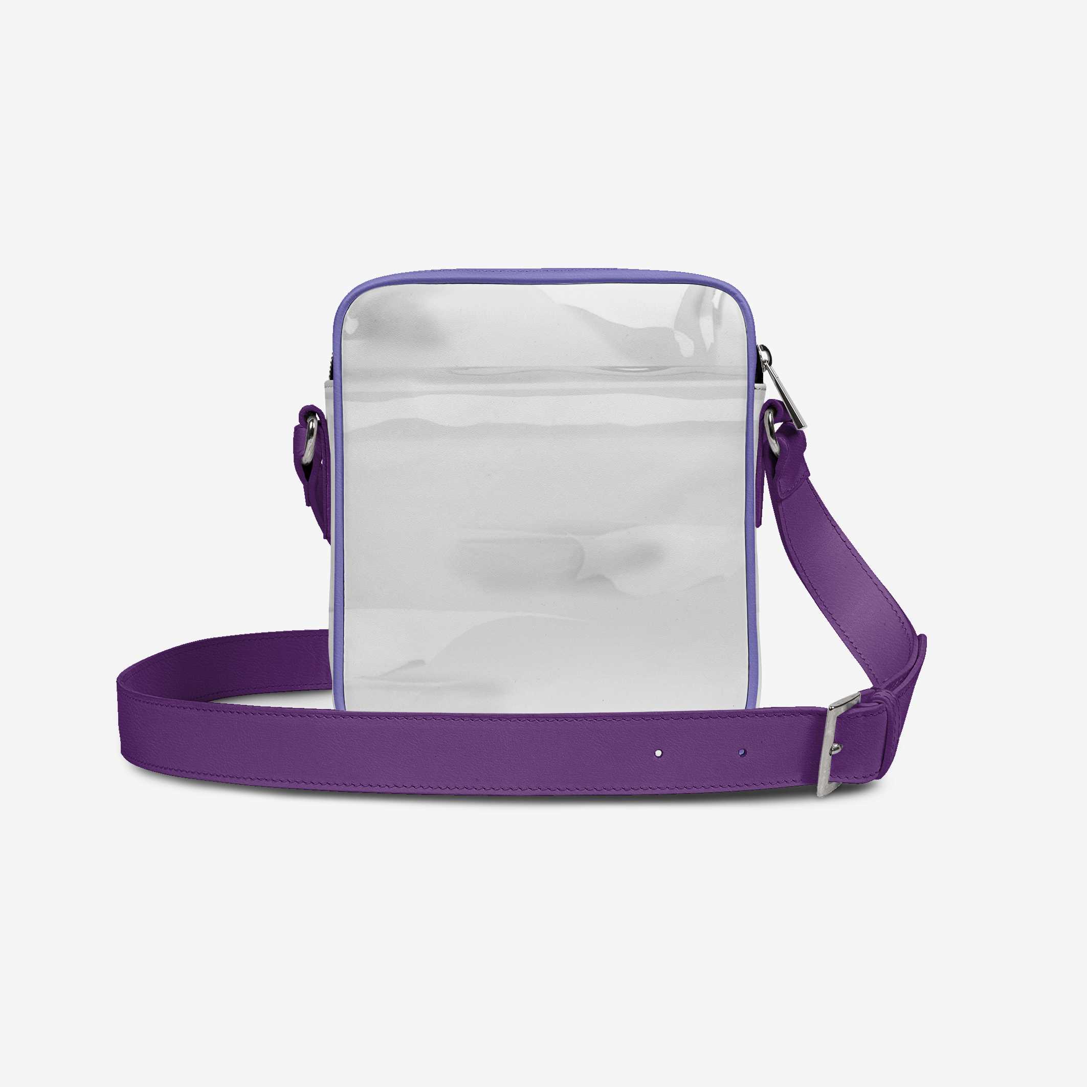 Clear crossbody bag with purple strap on a light gray background