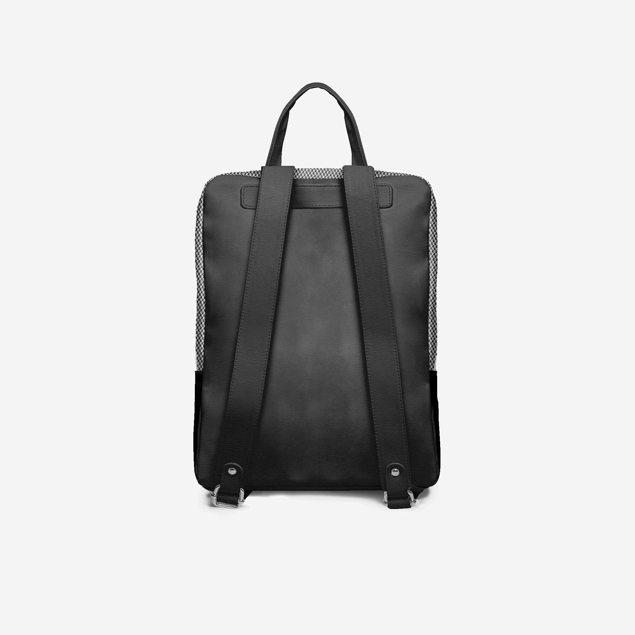Black backpack on a light gray background