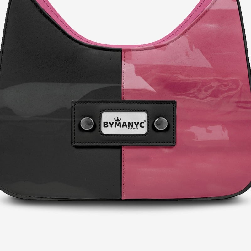 Black and pink handbag with 'BYMANYC' logo on a white background