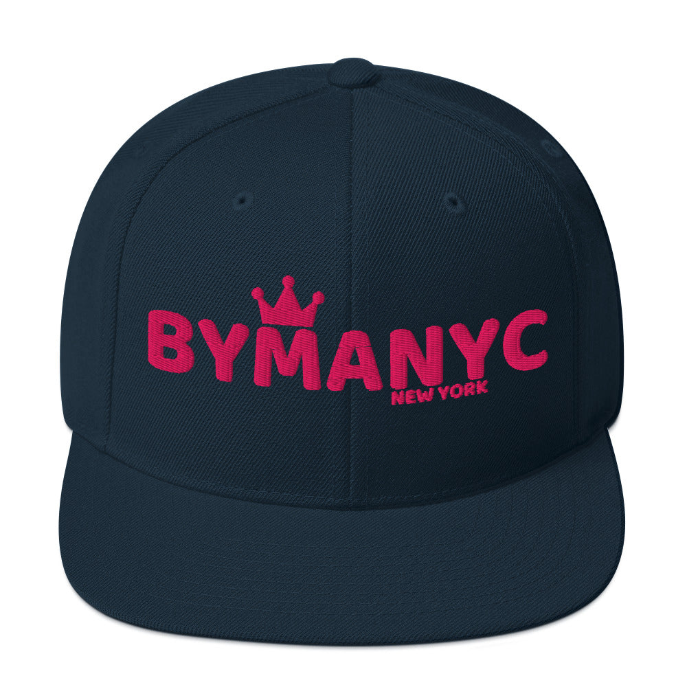 Navy blue cap with red 'BYMANYC New York' text on a white background