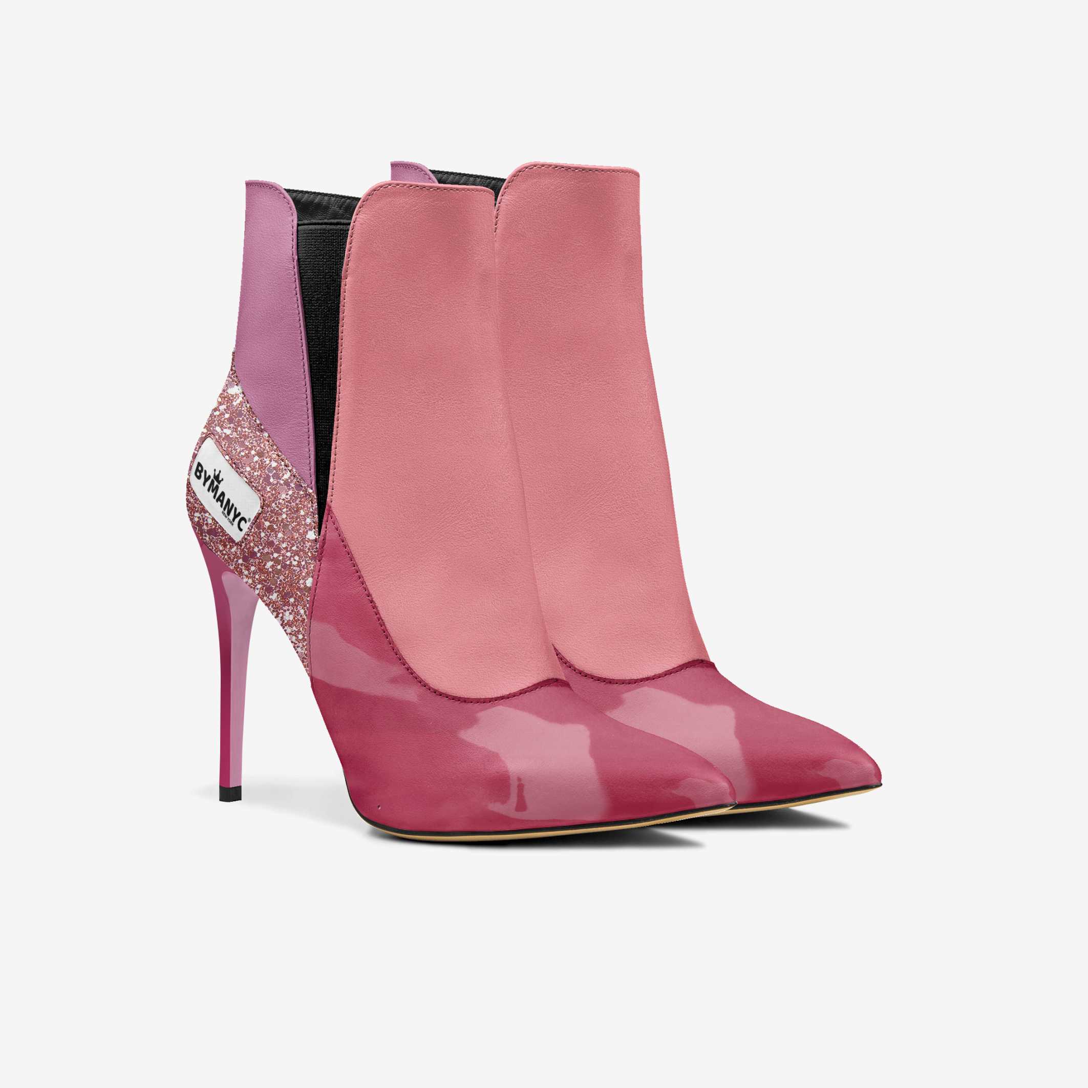 Pink high-heeled ankle boots with a brand logo on a white background