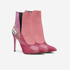 Pink high-heeled ankle boots with a brand logo on a white background