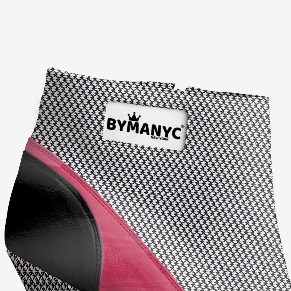 Black and pink shoe with a 'BY MANYC' label on a white background