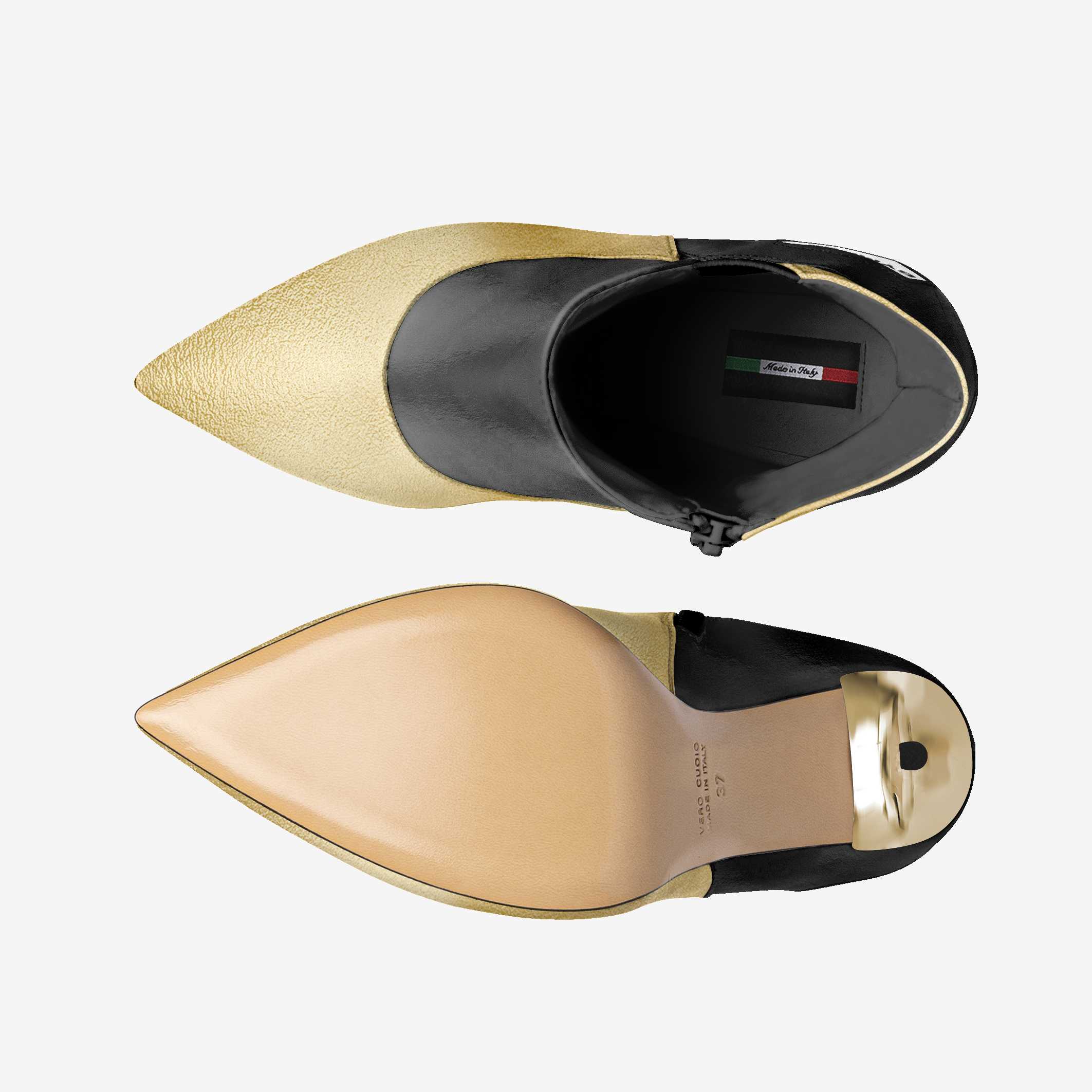 Pair of gold and black shoes on a white background