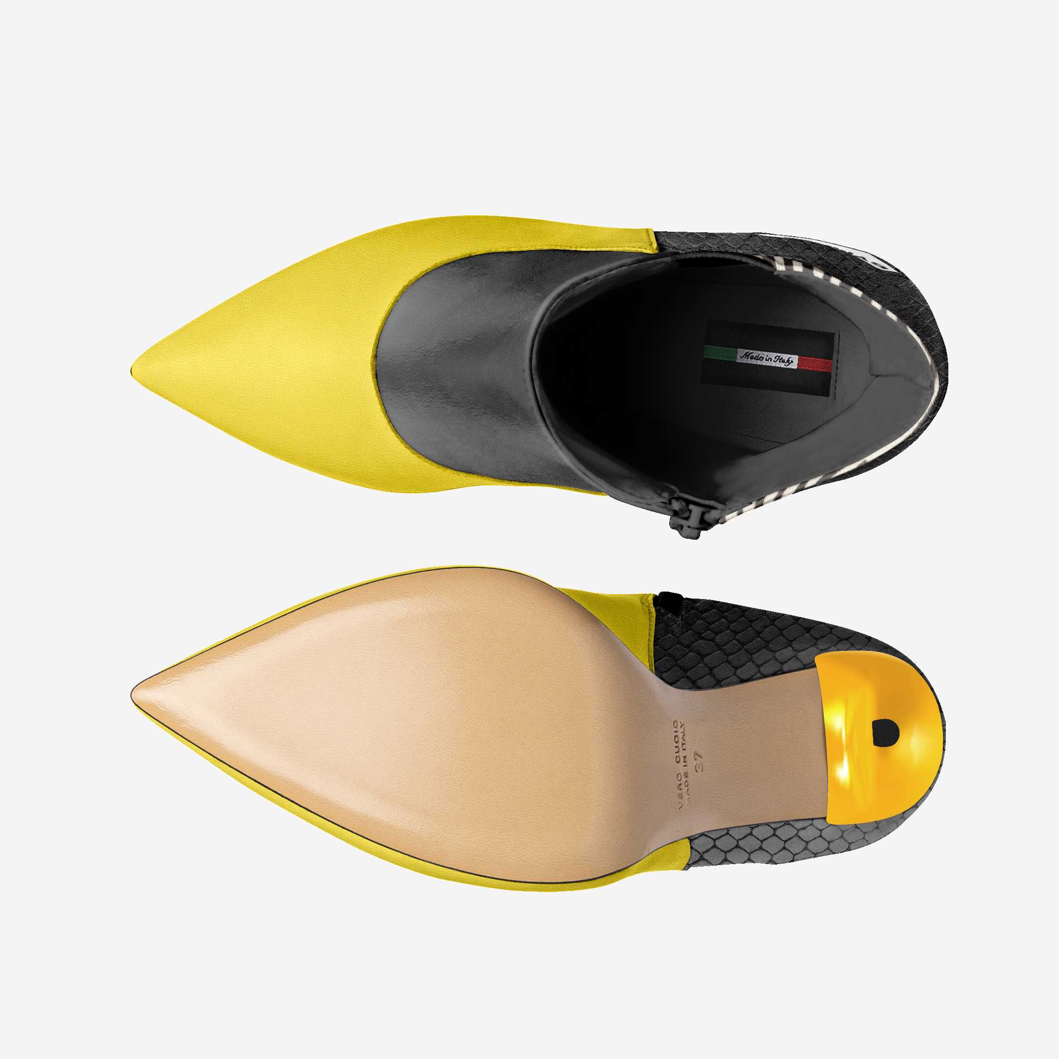 Yellow and beige pointed-toe shoes with black insole on a white background